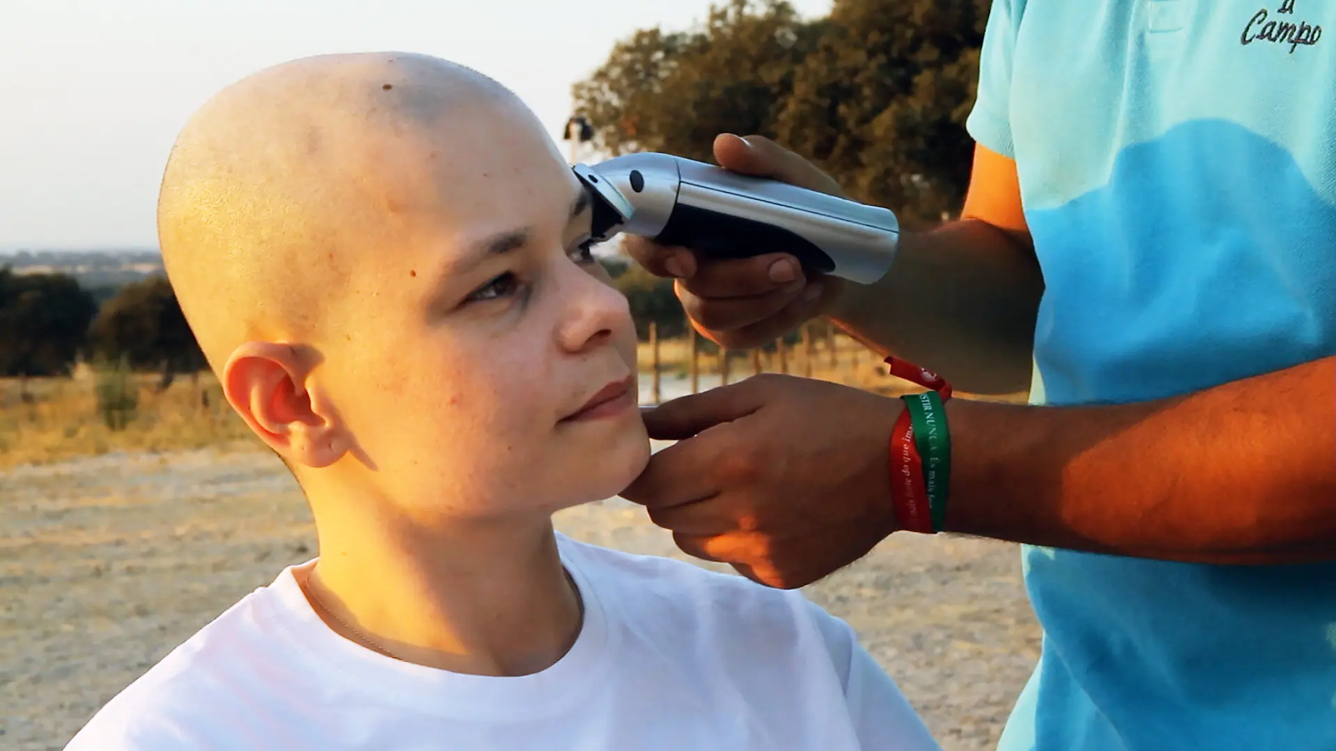 Moving Forward-shaving a woman's head due to cancer